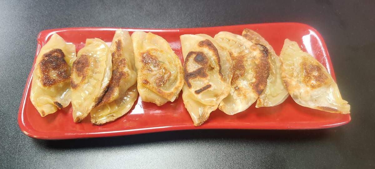 Chicken dumplings are one of the offerings on the base menu at Daikon Cafe.