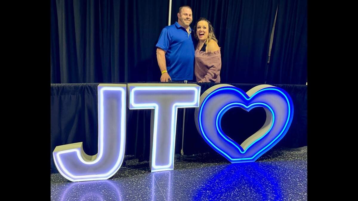 A sold-out crowd gathered at Intrust Bank Arena on Sunday night for a concert by Justin Timberlake. Some posed for photos in the arena concourse with a neon sign featuring the singer’s initials.