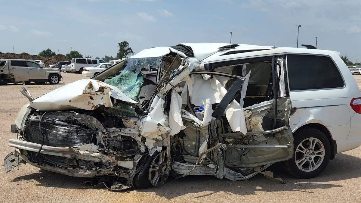 The van Jason Miller drove in a June 8 crash in Derby was crushed in the head-on collision that killed the other driver. Miller was critically injured.