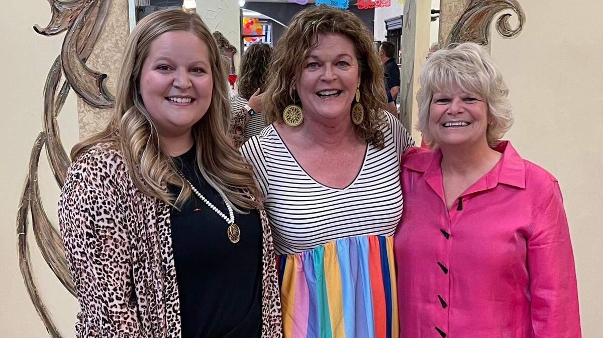 Lisa Hambelton, right, has purchased K. Lane’s Boutique from Diana Schmidt, center, and Hambelton’s daughter, Taryn Taylor, left, will run the longtime business.