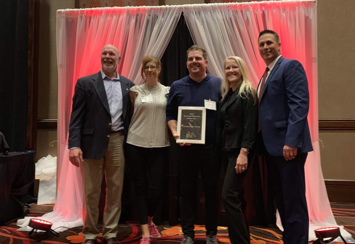 The Chicken N Pickle crew picked up the award for Hot New Concept at Monday’s Kansas Restaurant and Hospitality Association Awards.