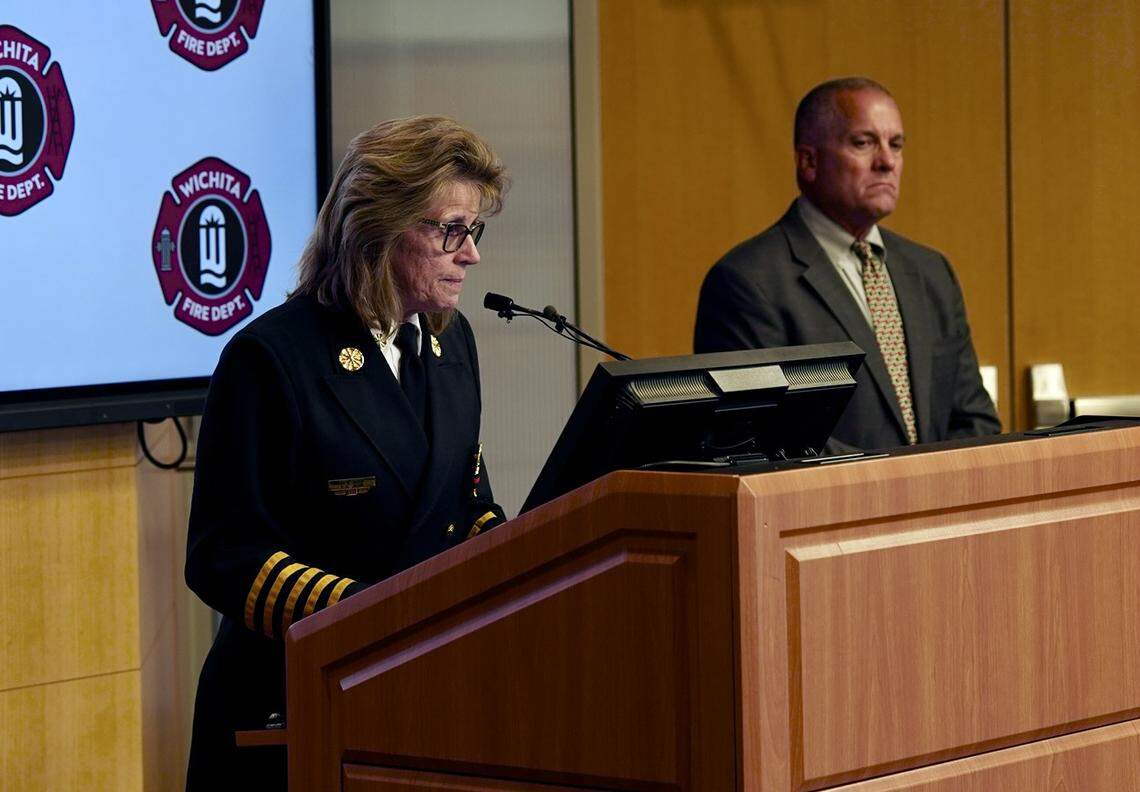 Wichita Fire Department Chief Tammy Snow, flanked by WFD local union president Ted Bush, talks about the death of a firefighter who became unresponsive at a south Wichita house fire on Thursday.
