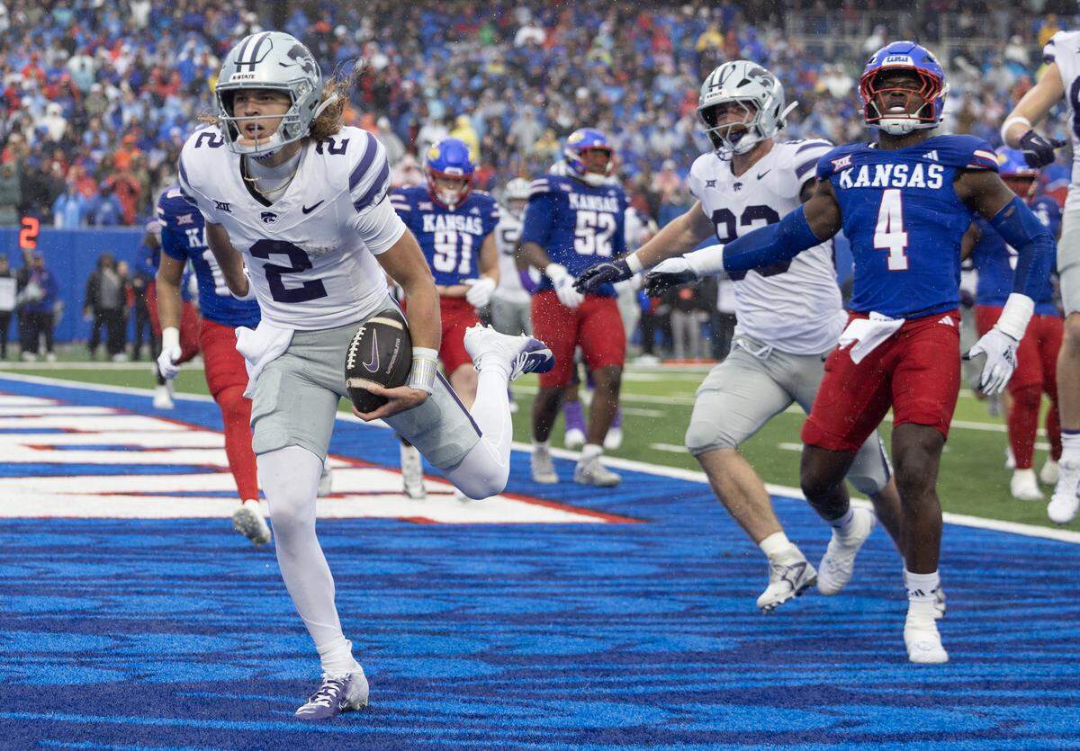 Kansas State’s Avery Johnson scores a touchdown in the first quarter of the game against Kansas at David Booth Kansas Memorial Stadium on Saturday, Oct. 25, 2025.