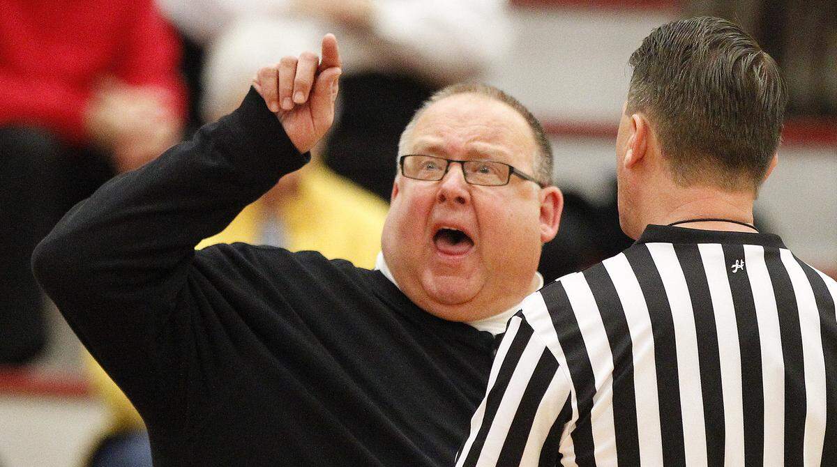 Friends coach Dale Faber gives the ref a piece of his mind in the second half of heir game with Tabor at Friends University Wednesday. (Jan 22, 2014)