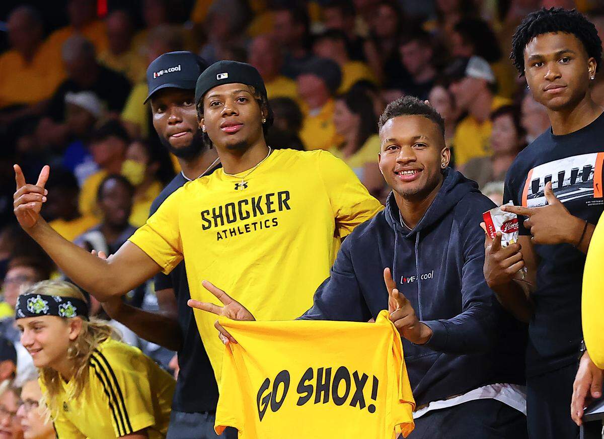 Current Shockers like (from left to right) Morris Udeze, Monzy Jackson, Dexter Dennis and Ricky Council soaked up the TBT games and atmosphere in the crowd with fans.