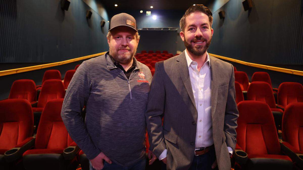 Tyler Cooper, left, and business partner Ryan Blasdel are opening Boulevard Theatres on the west side of Towne West Square where Regal’s Movie Machine had been.