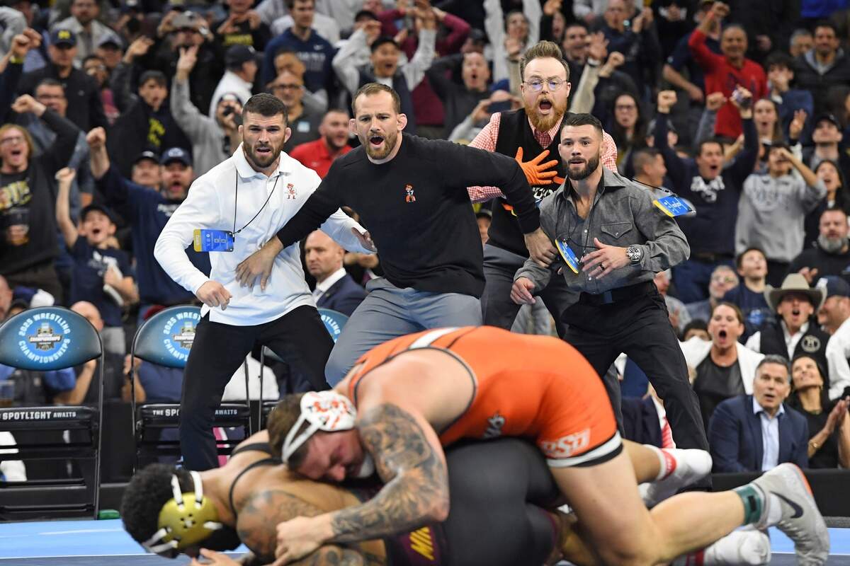 Oklahoma State Cowboys coach David Taylor watches as Wyatt Hendrickson defeats Gable Steveson of the Minnesota Golden Gophers during the Division I Men’s Wrestling Championship held at Wells Fargo Center.