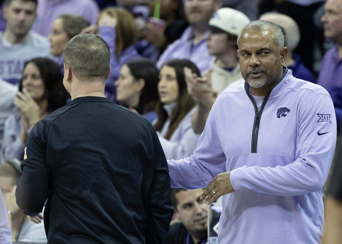 Kansas State coach Jerome Tang shakes hands with Wichita State coach Paul Mills after Kansas State’s 69-60 win over the Shockers at T-Mobile Center in Kansas City. Tang and Mills were assistant coaches together at Baylor. 