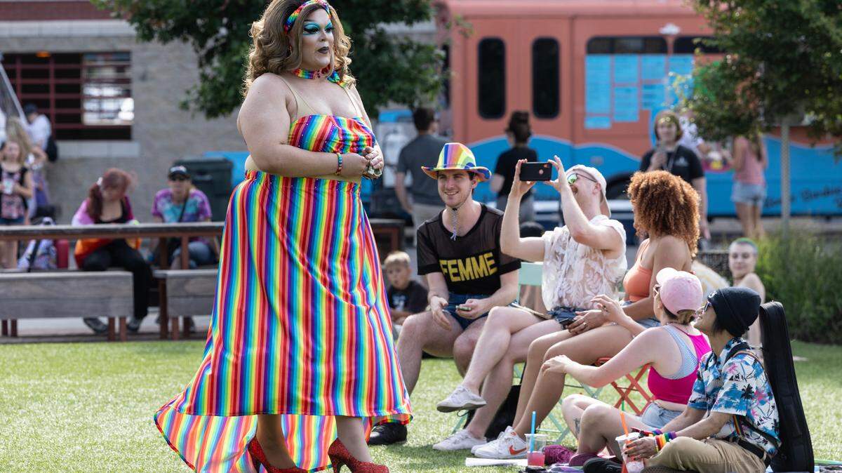 A drag performer takes part in a pride event at Naftzger Park in 2023.