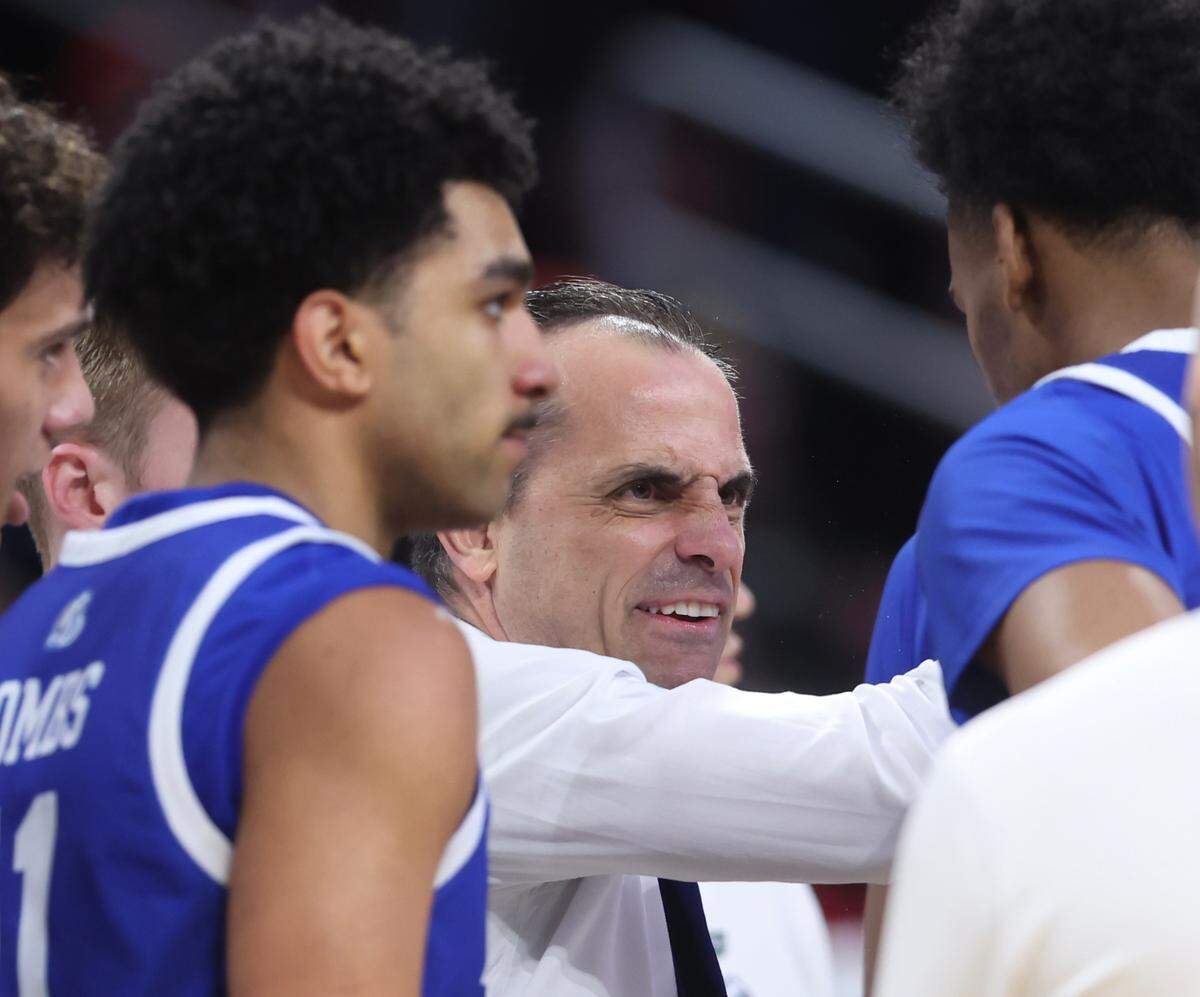 Drake head coach Ben McCollum yells to his team during a timeout against Texas Tech on Saturday, March 22, 2025.