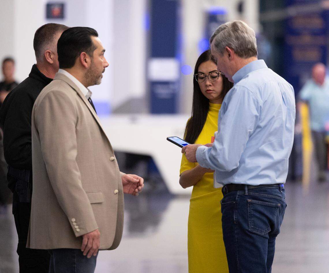From left, Airport Director Jesse Romo, Wichita Mayor Lily Wu and Wichita City Manager Robert Layton gather at Wichita’s Eisenhower Airport on Wednesday after news that an American Airlines flight from Wichita collided with a helicopter near Ronald Reagan Washington National Airport.