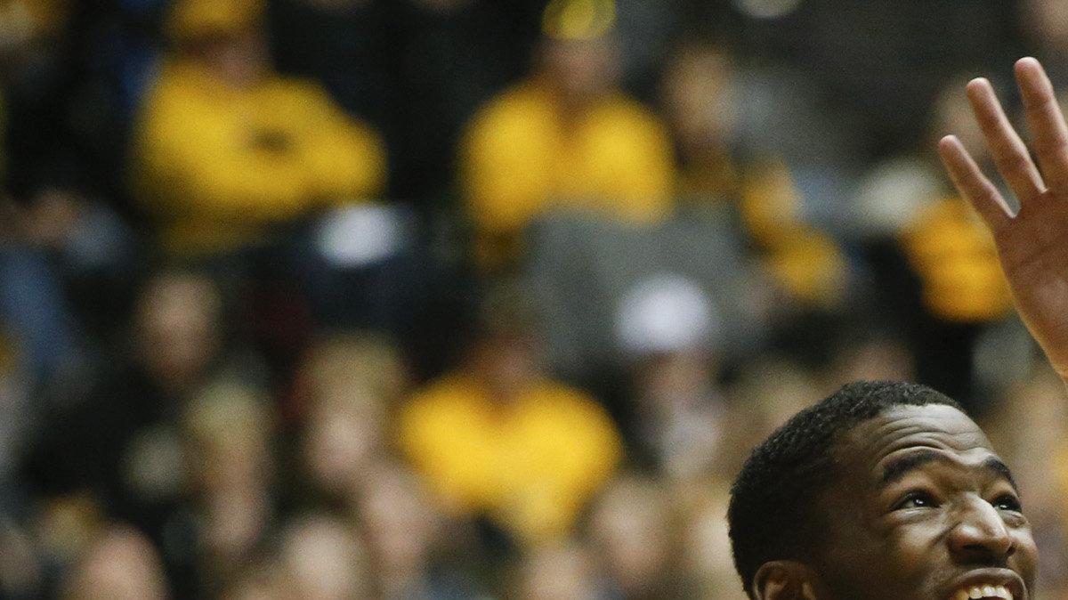 Wichita State guard Ron Baker (31) defends Loyola guard Devon Turk (4) in the second half at Koch Arena. (January 28, 2014)
