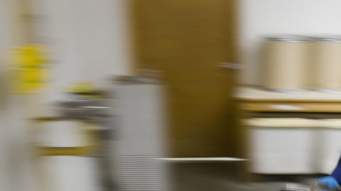 Tricia Stone rolls a container of one of the many chemicals used in the processing of Kodachrome film. The primary difference between Kodachrome and  other reversal films is that the dyes are in the processing chemicals rather than in the film emulsion, which contributes to the film's color saturation and extraordinary archival qualities.