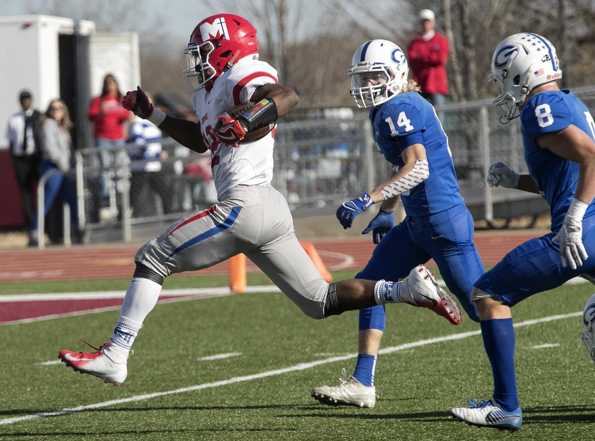 Brison Cobbins #22, scored Bishop Miege’s 2nd touchdown in the first quarter of the game against Goddard in the Kansas Class 4a championship Saturday, November 24, 2018 at Topeka Hummer complex. Bishop Miege won the championship.