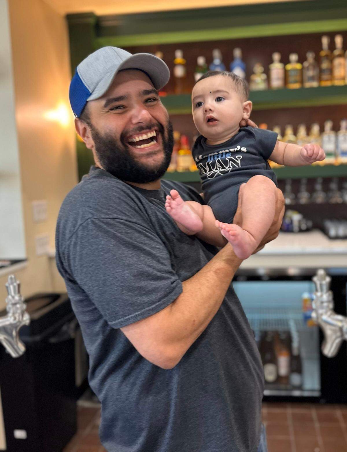 N&J co-owner Nick Srour with his 5-month-old son, Pierce