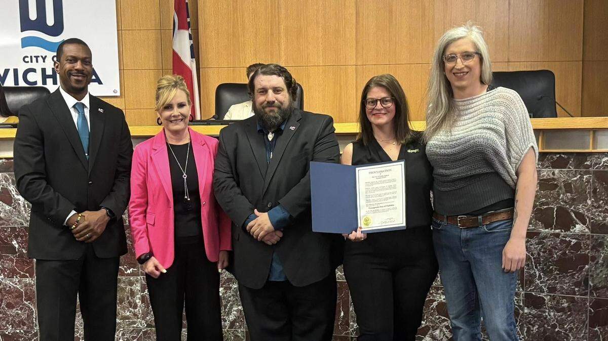 Wichita City Council members Brandon Johnson, Becky Tuttle, Mike Hoheisel and Maggie Ballard stood for a photograph with Abi Boatman, a representative of Wichita’s transgender community, after those council members voted for a proclamation for Transgender Visibility Day. Mayor Lily Wu declined to be in the photo or to sign the proclamation, and stayed at her seat on the bench along with council members Dalton Glasscock and J.V. Johnston.
