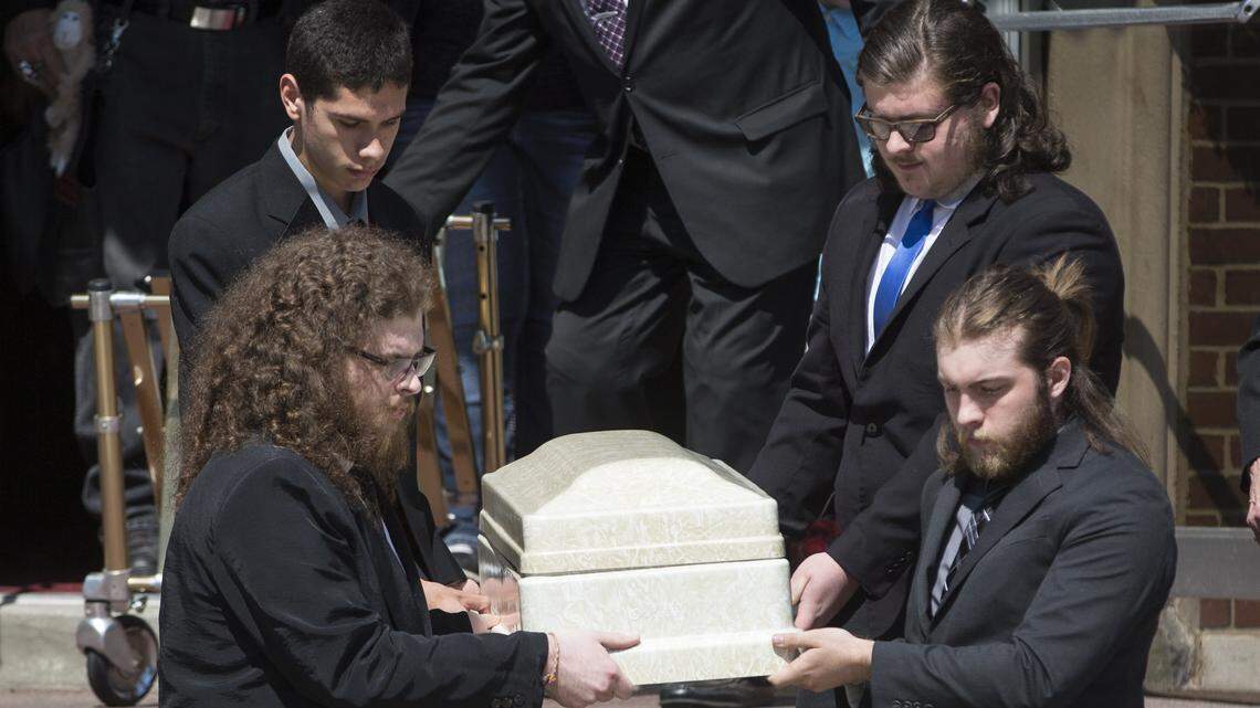 Pallbearers carry the casket of 2-year-old Anthony "Tony" Bunn out of St. Joseph Catholic Church after his funeral May 17.  He would have turned 3 on July 23.