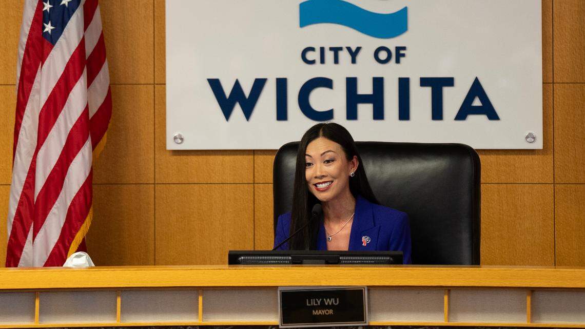 Lily Wu takes the bench after being sworn in as mayor of Wichita.