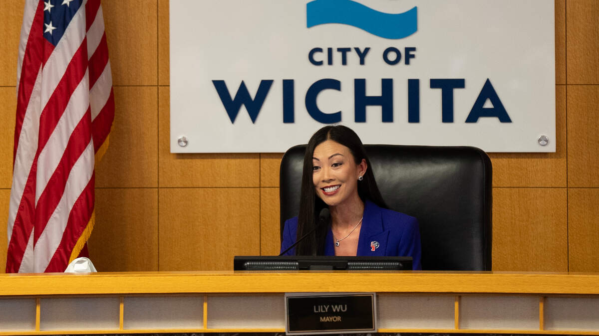 Lily Wu takes the bench after being sworn in as mayor of Wichita.