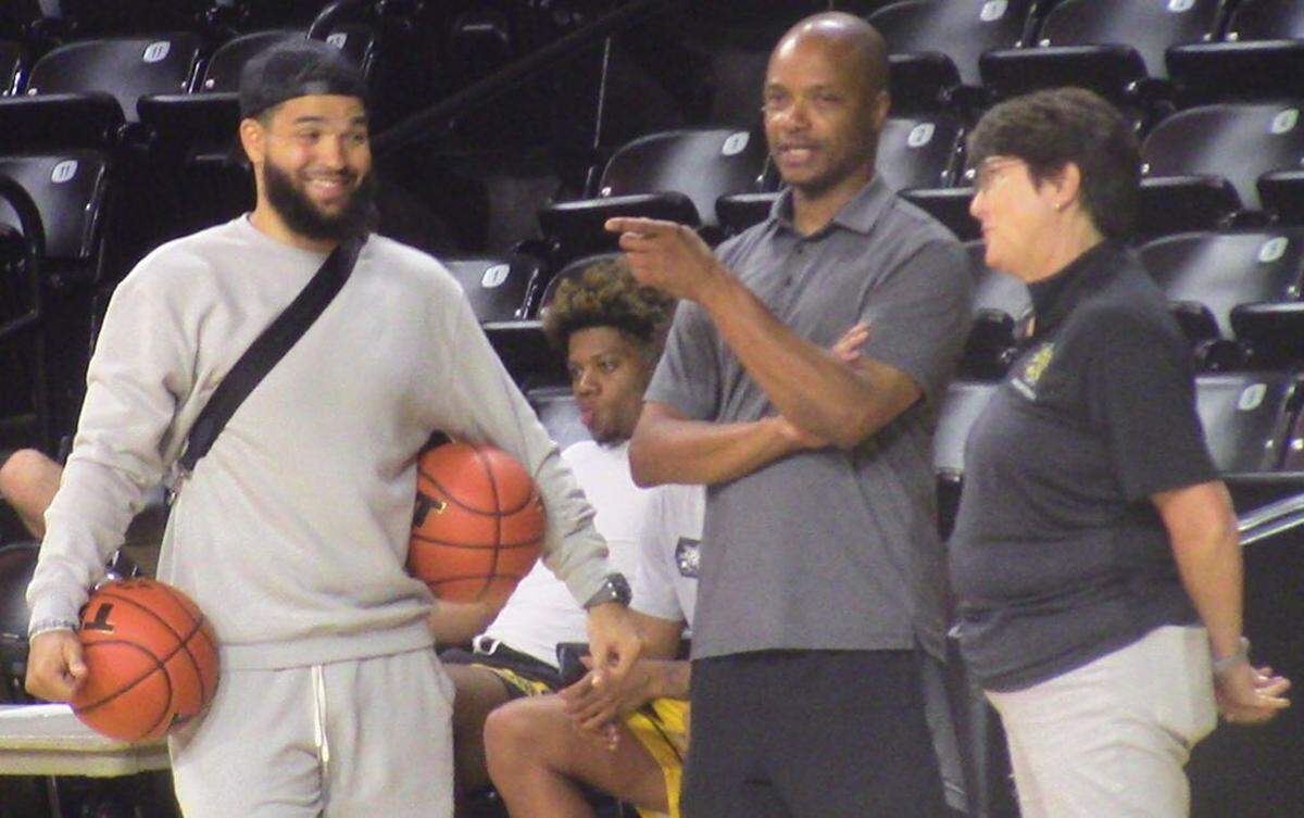 Fred VanVleet catches up with WSU men’s basketball coach Isaac Brown and WSU academic advisor Gretchen Torline.