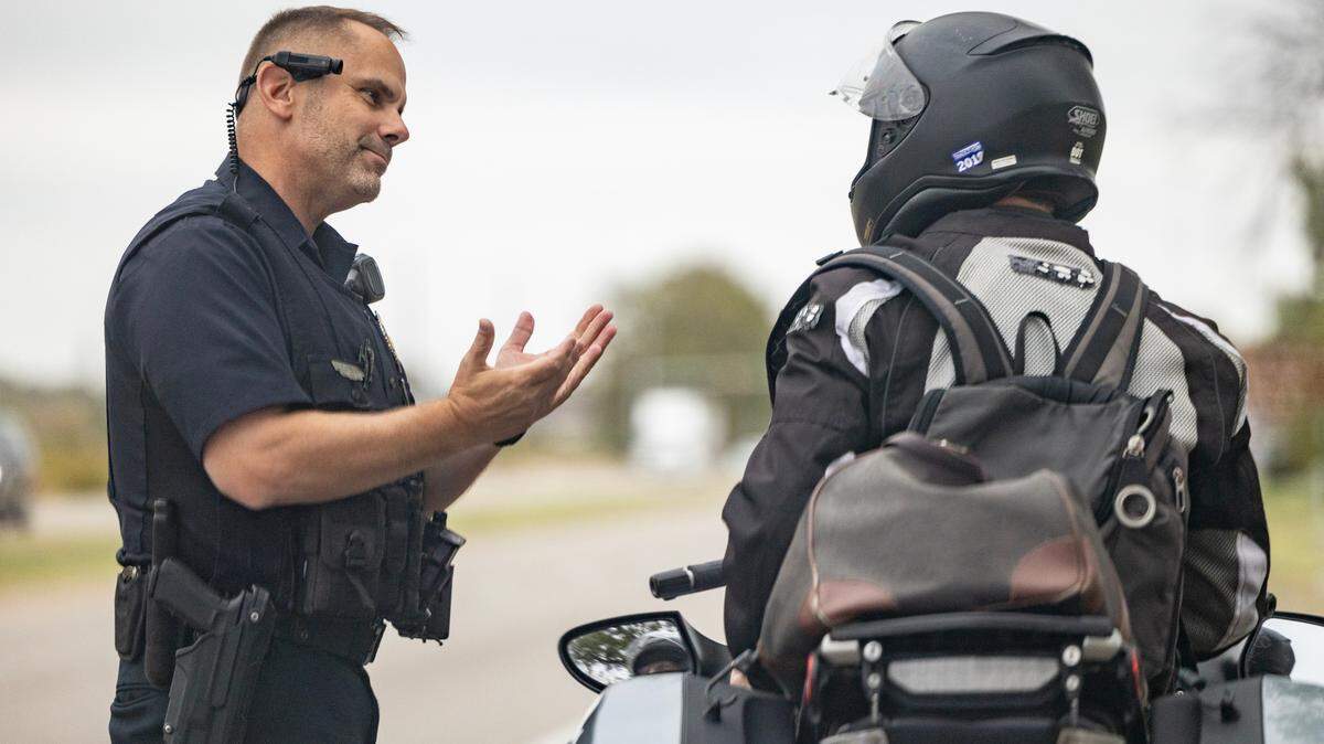 Wichita police Officer Ryan O’Neil pulls over a motorcyclist for speeding on K-15 in south Wichita.