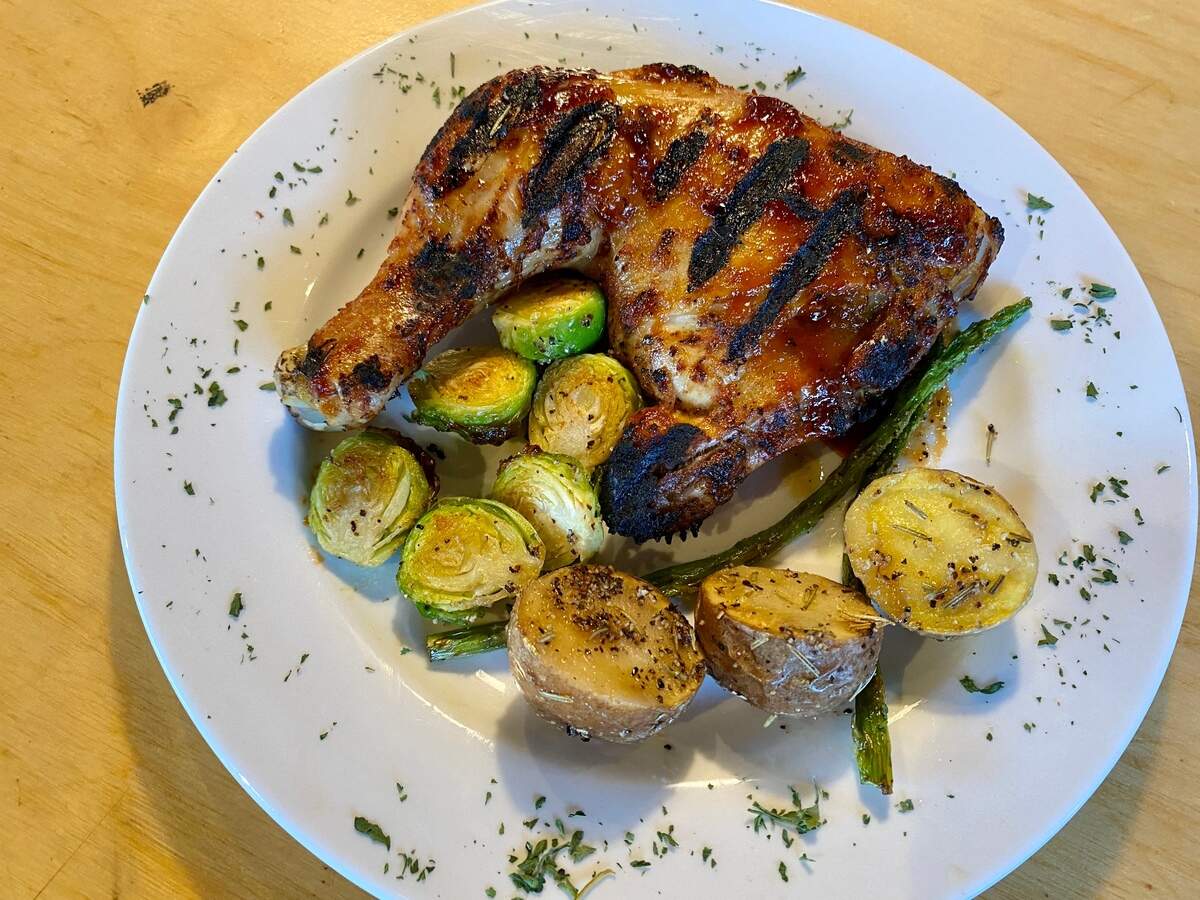 Barbecue chicken with potatoes and veggies is one of the menu options at Chef’s Table Roadhouse, which opens on Friday in Wichita.