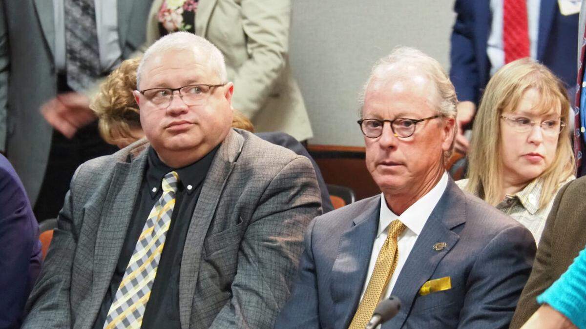 Emporia State University president Ken Hush, right, received approval from the Kansas Board of Regents to deploy a policy designed to expedite personnel and program reform.