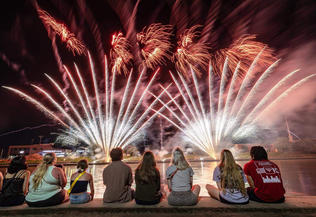 Fireworks explode over the Arkansas River on the final night of the 2025 Wichita River Festival.