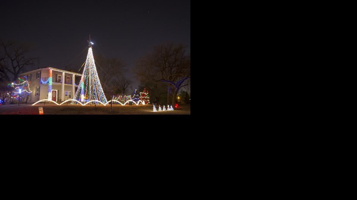 Clayton Gossett’s two-story house at 3805 Longview Lane has an animated Christmas light display set to funky music.

