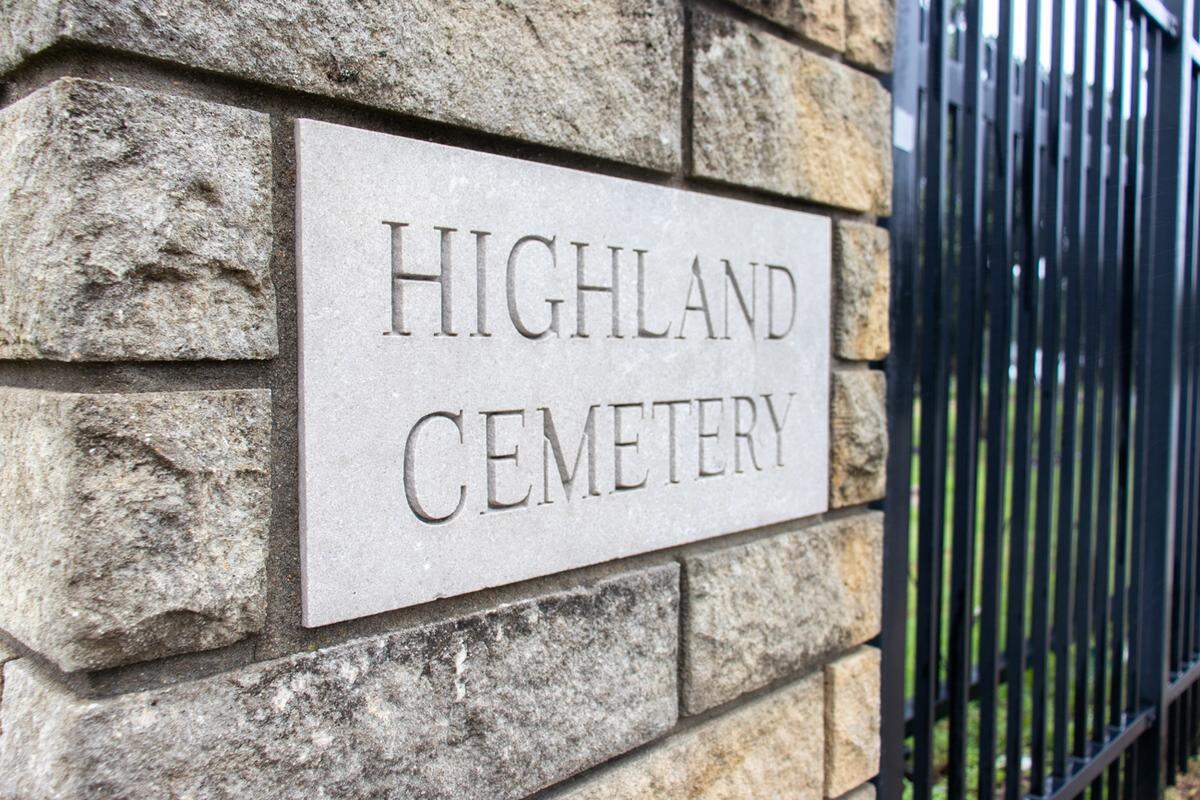 The stone sign for Highland Cemetery, the oldest cemetery in Wichita, sits on display outside of the cemetery’s gates. The historic cemetery is also known as the “resting place of pioneers,” including several of Wichita’s founders.