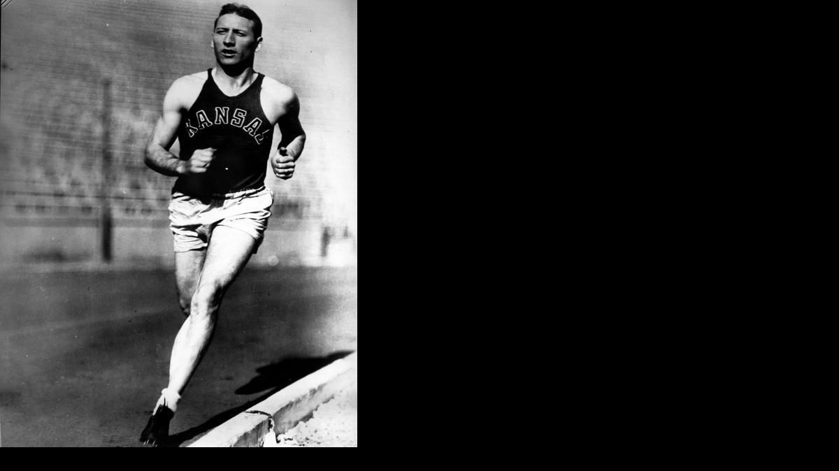 Glenn Cunningham one of the premier milers in the 1930s, is shown running as a member of the University of Kansas track team. After a fire severely burned his legs, Glenn Cunningham recovered to become one of the nation’s greatest milers. He was named outstanding track performer in the 100-year history of Madison Square Garden. He also was inducted into the National Track and Field Hall of Fame.