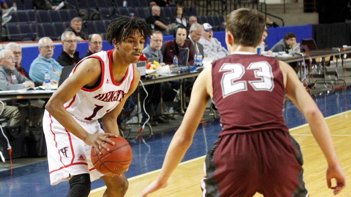 Wichita Heights' senior Braxton Kirkendoll helped lead the Falcons to a City League boys basketball title in 2017-18.