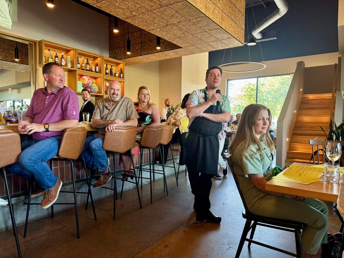 First Mile Kitchen owner and chef Nick Korbee greets guests at a recent Monthly Moods vinyldinner at his restaurant, 2141 N. Bradley Fair Parkway.