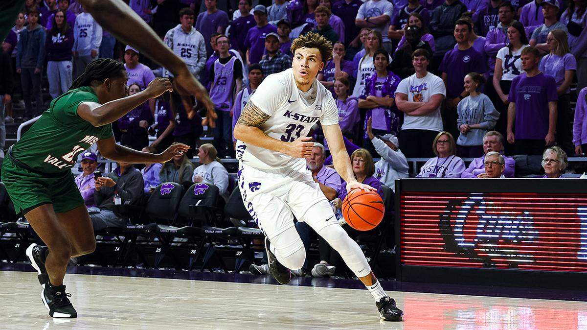 Kansas State basketball player Coleman Hawkins drives to the hoop against Mississippi Valley State.