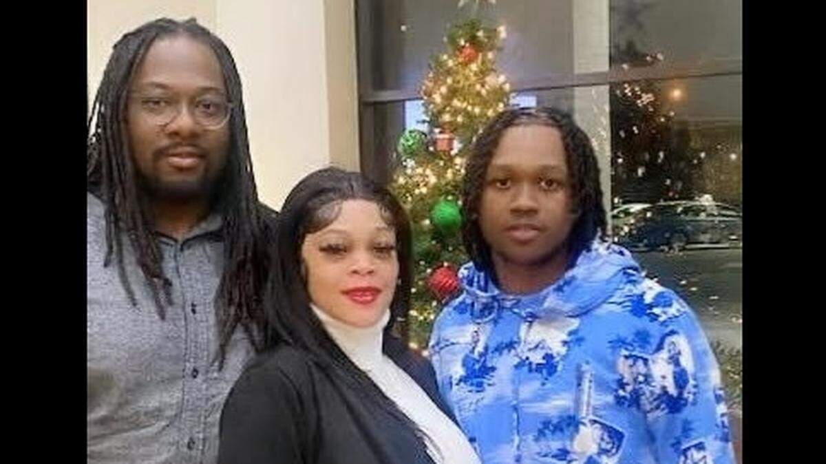 Michael Shelton Sr., Jamilah Smith and their son, Michael Shelton Jr., pose for a photo in December 2022. Shelton Sr. was shot and killed Tuesday morning outside of his east Wichita apartment.