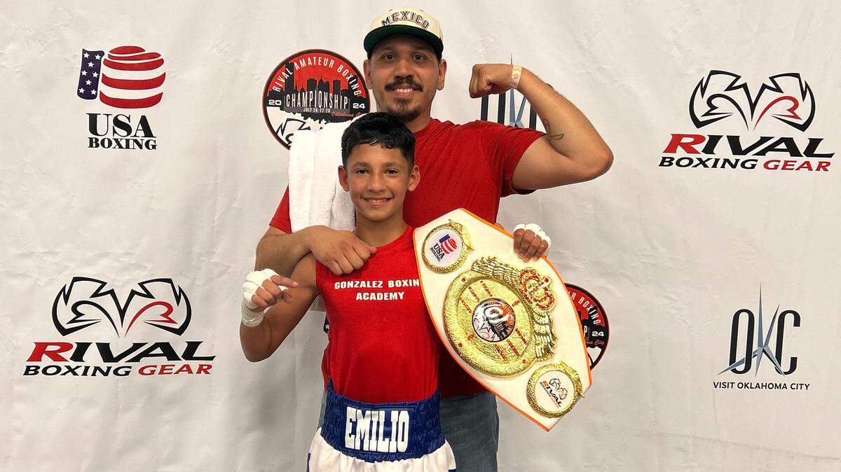 Ricardo Gonzalez and his son, Emilio, for whom he converted his three-car garage to a boxing studio. Now, Gonzalez is moving his Gonzalez Boxing Academy & Fitness from Park City to the former Pig In! Pig Out! space at 13th and Washington.