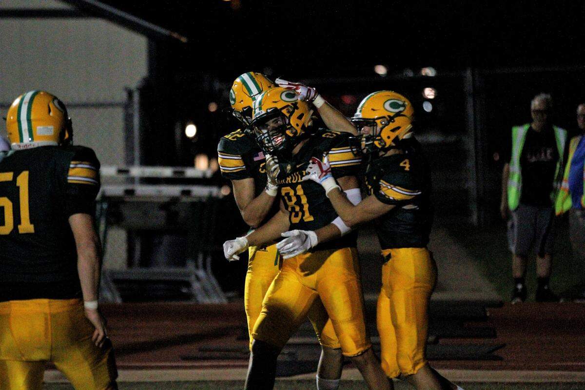 Bishop Carroll senior receiver Mason Baalman celebrates a touchdown against Wichita Northwest during the Grizzlies 23-22 win over the Golden Eagles on Friday night. (Aug. 31, 2018)