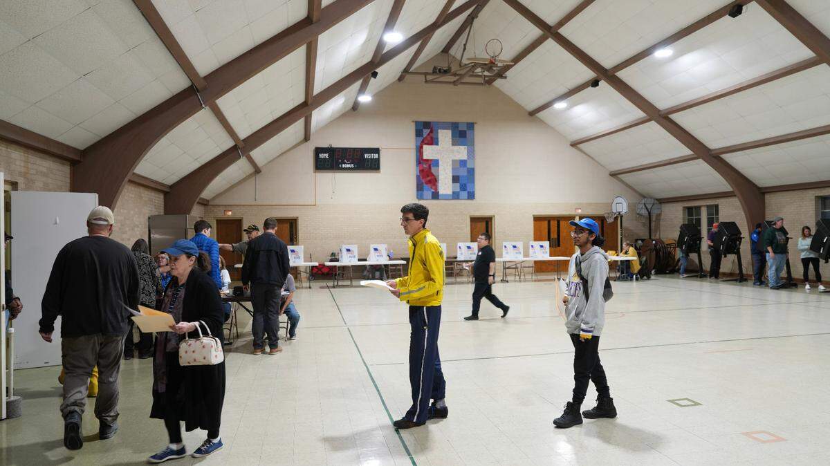 Voters cast their ballots at Woodland United Methodist Church at 1100 W. 15th St. on Election Day.