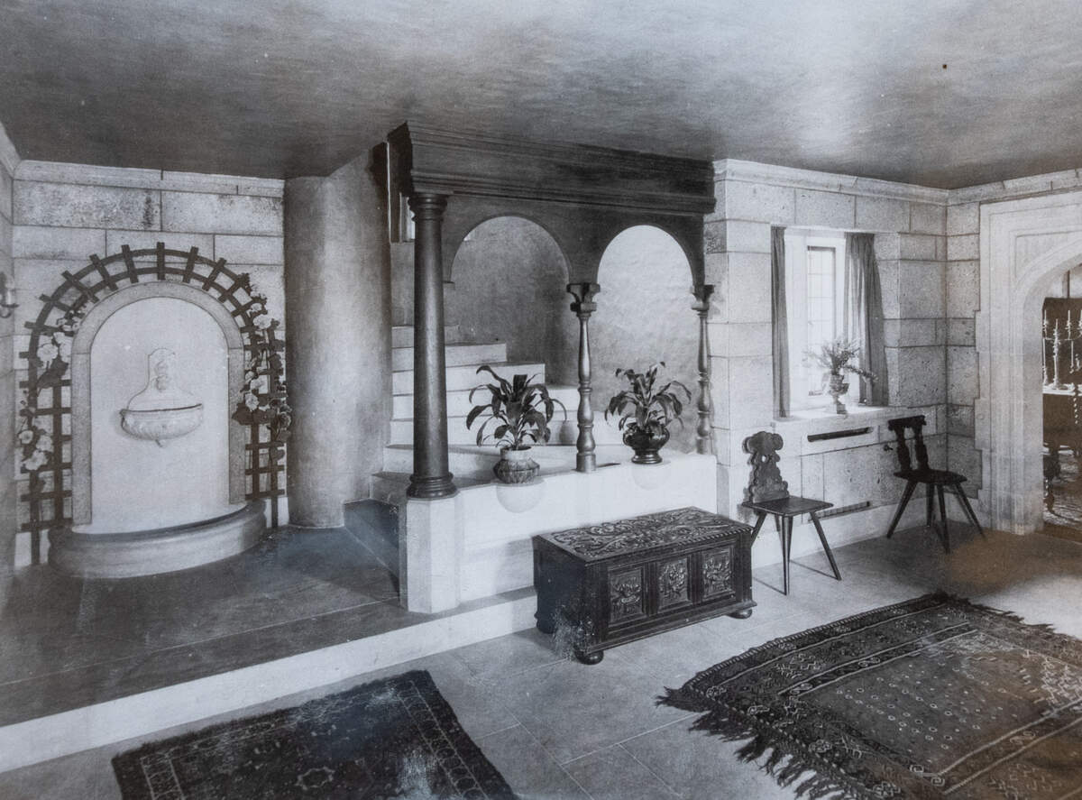 The owner of The Clapp Manor at 320 N. Belmont, Grant Rine, inherited early photos of the interior of the house. The entry way and the winding stone staircase are mostly unchanged from the 1920s.