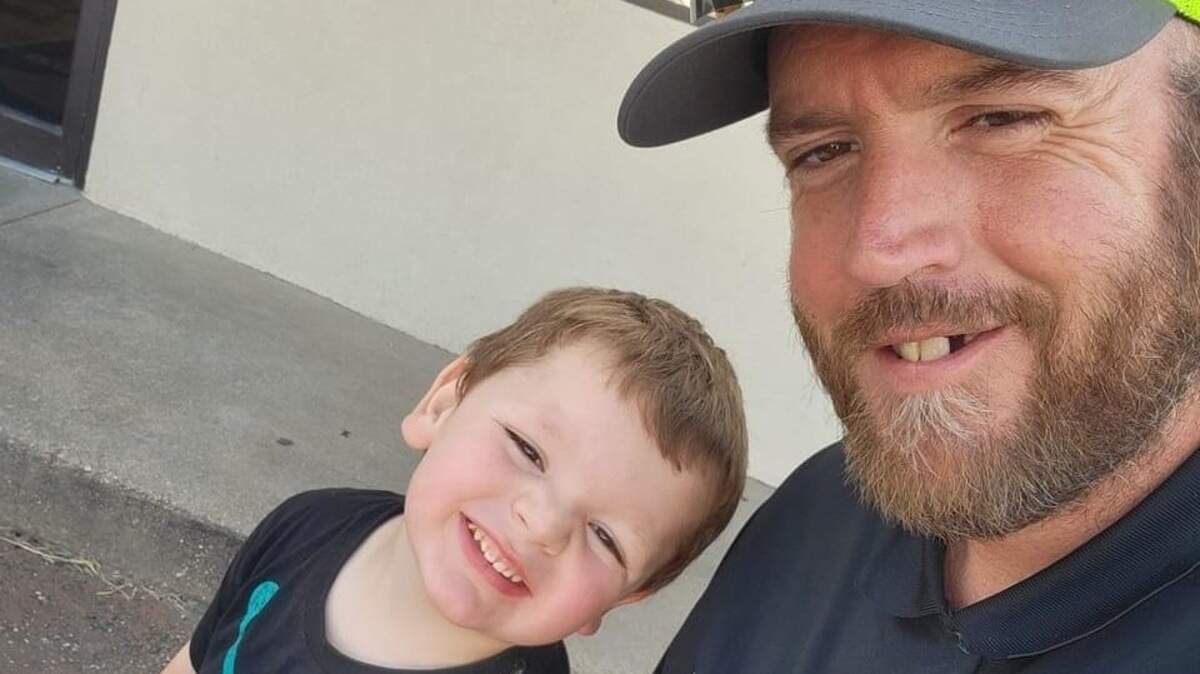 Austin Zink pictured with his son Declan.