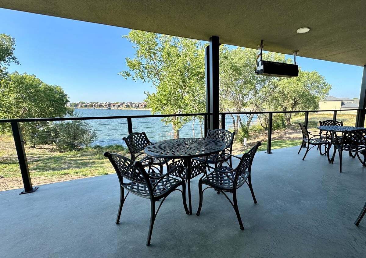 The patios at the new Deano’s at 37th and Ridge look out over a private, residential lake.