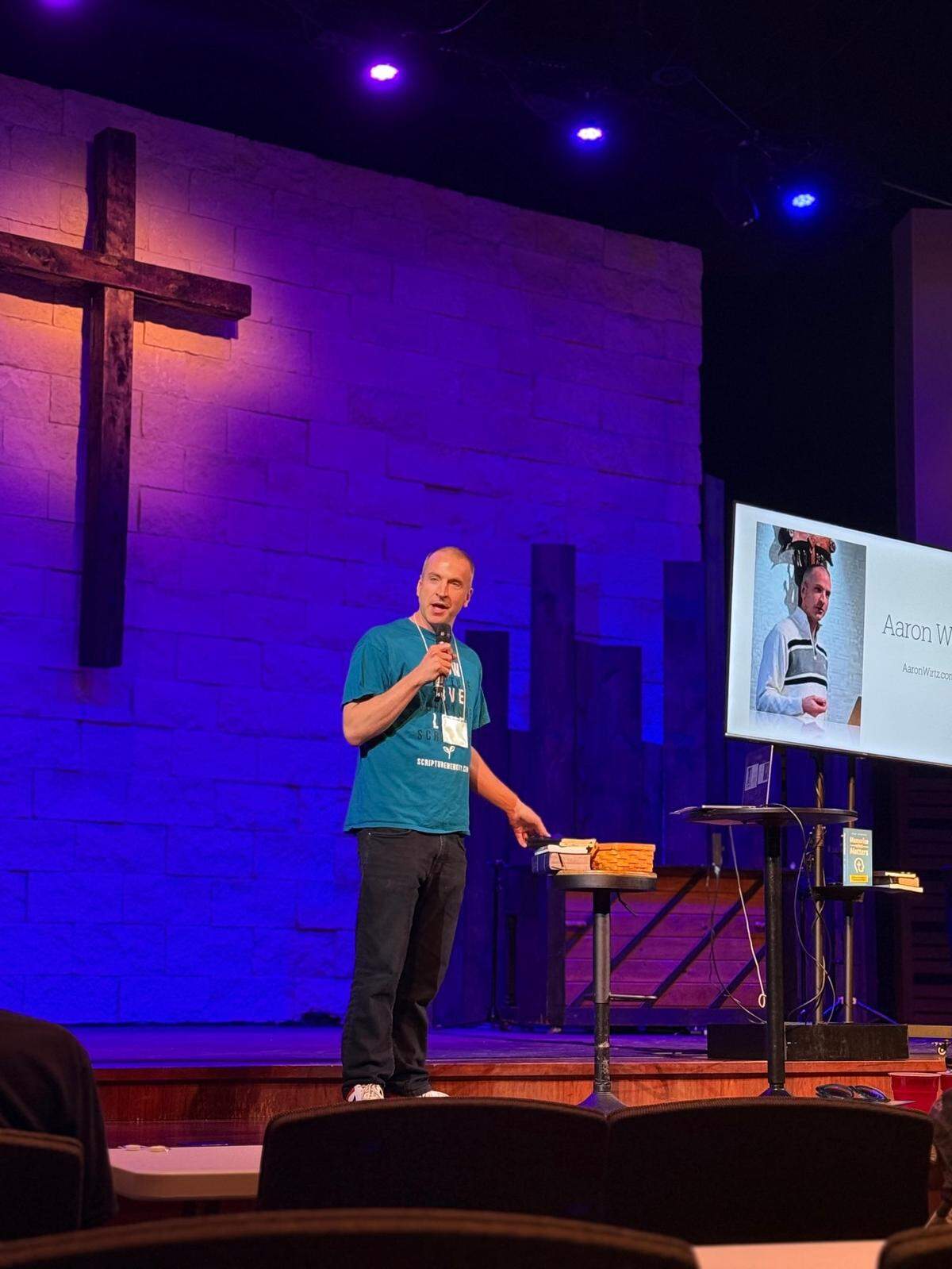 Aaron Wirtz speaking at a scripture conference in Dallas this month.