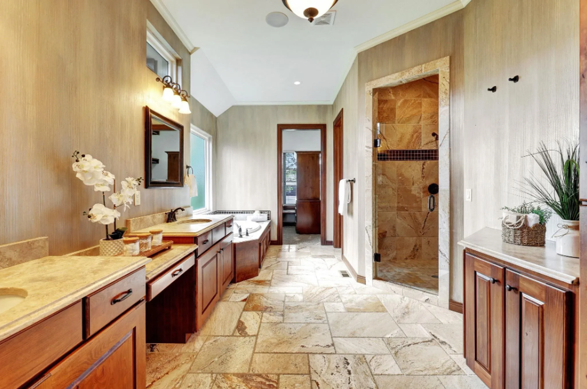 A look inside the primary bathroom of 2612 N. Paradise Court, a waterfront Wichita property listed for $1 million.