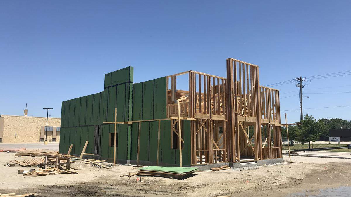What's the restaurant building taking shape at 13th and Oliver? Many readers want to know.