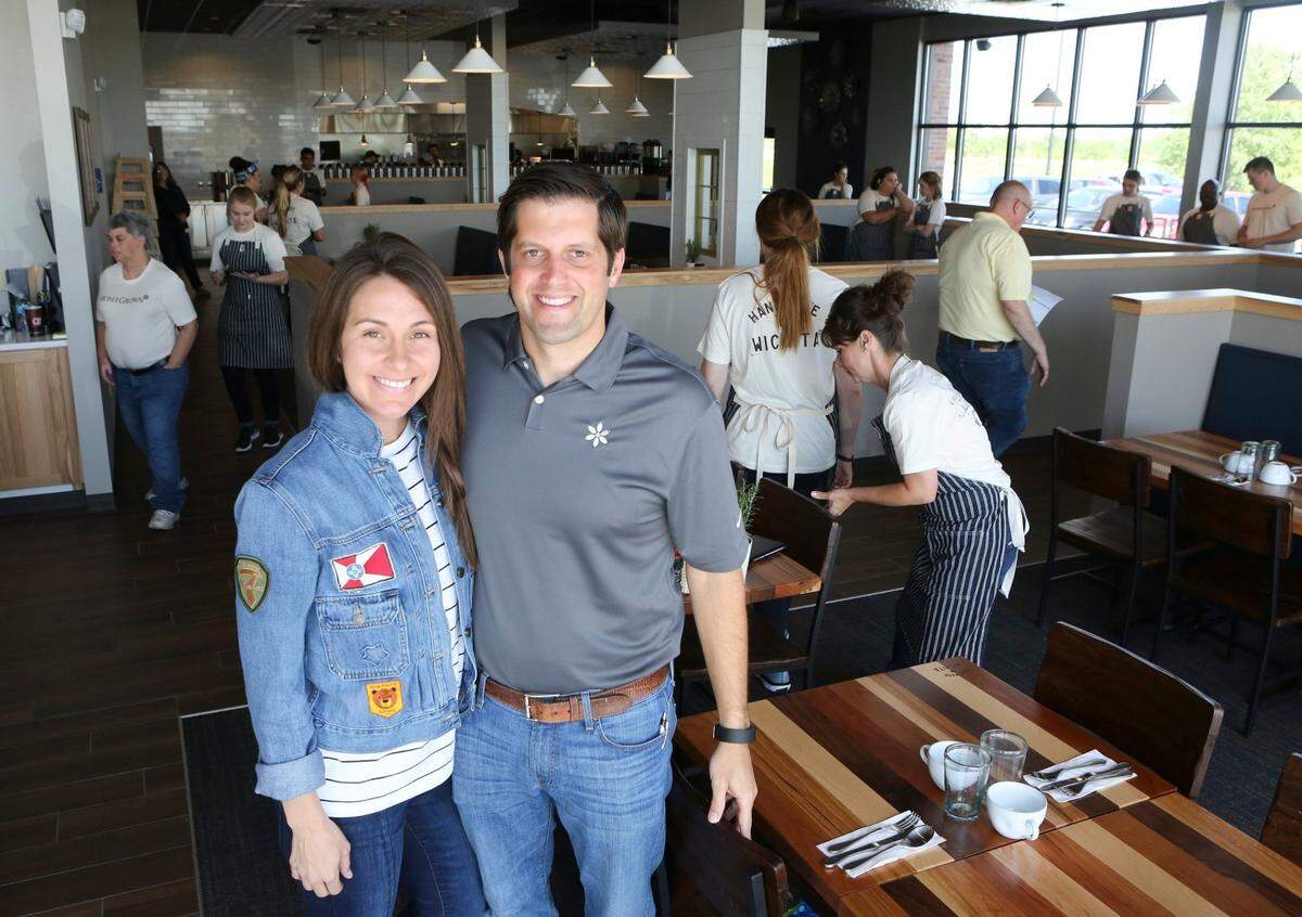 Jon and Lauren Rolph are pictured in Wichita’s first HomeGrown restaurant in 2017.