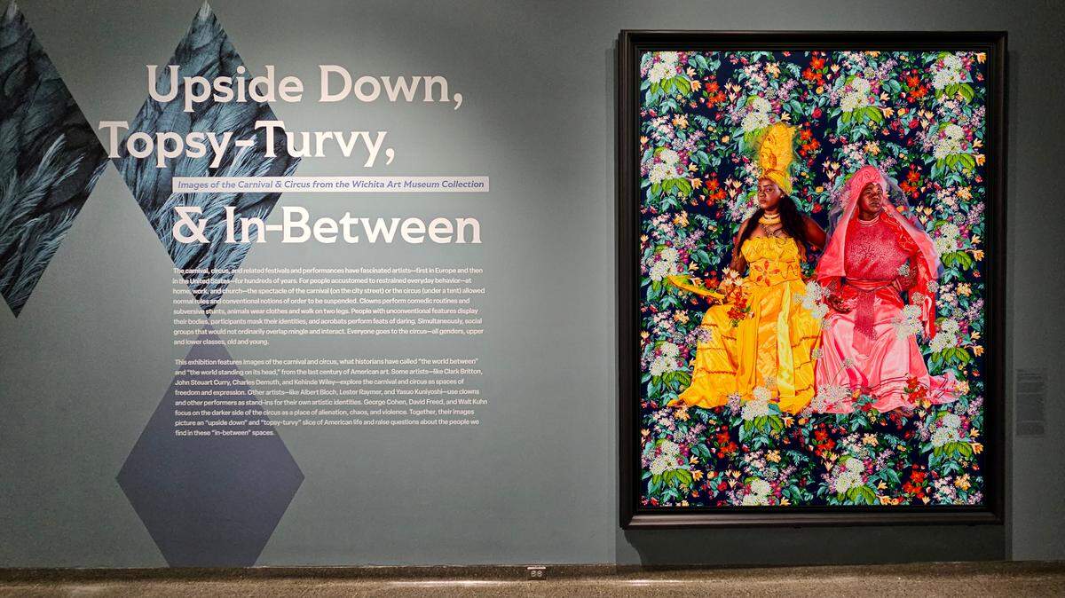 The Wichita Art Museum will feature Kehinde Wiley’s “Portrait of Yaima Polledo & Isabel Pozo” as part of a new Carnival-themed exhibit. The museum has used part of the $10.5 million proceeds from the sale of a Henry Moore sculpture for this first purchase from the new American Art Acquisition Fund.