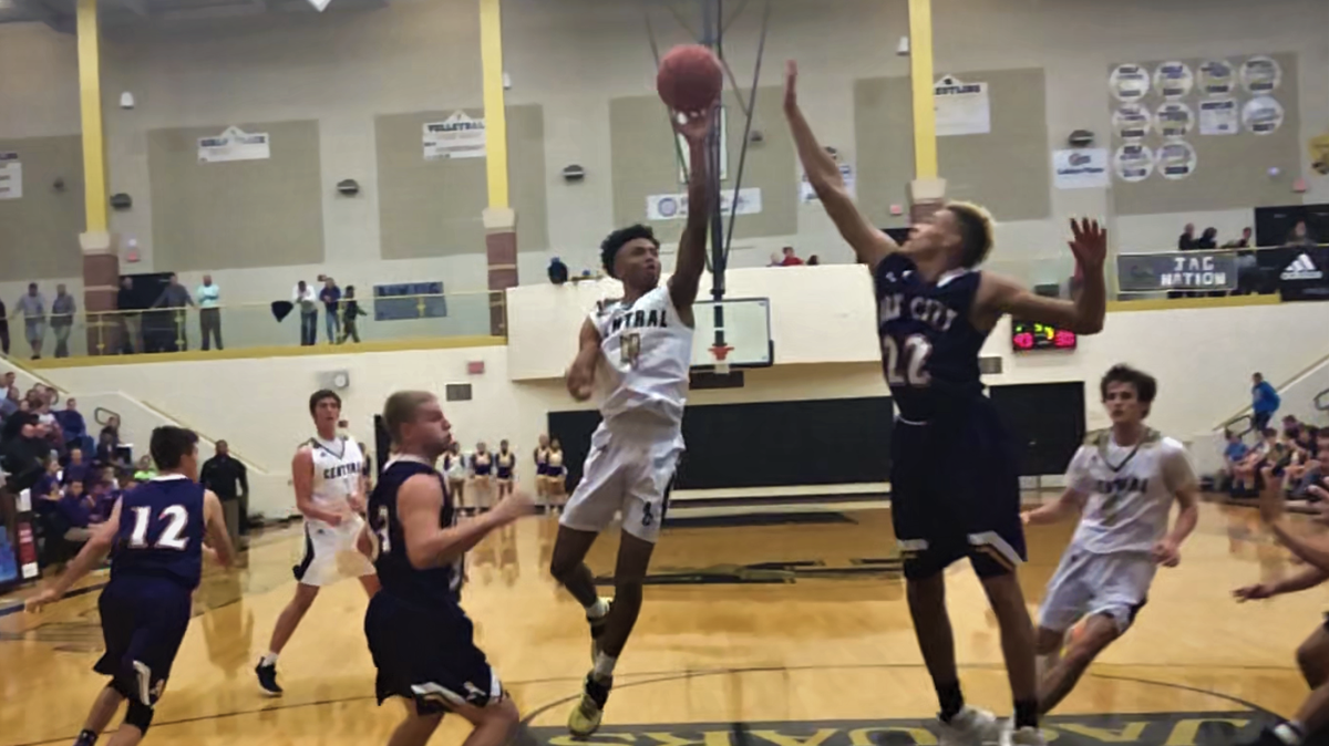Andover Central junior Xavier Bell drives the lane during the Jaguars’ 70-44 win over Arkansas City on Tuesday. (Dec. 18, 2018)