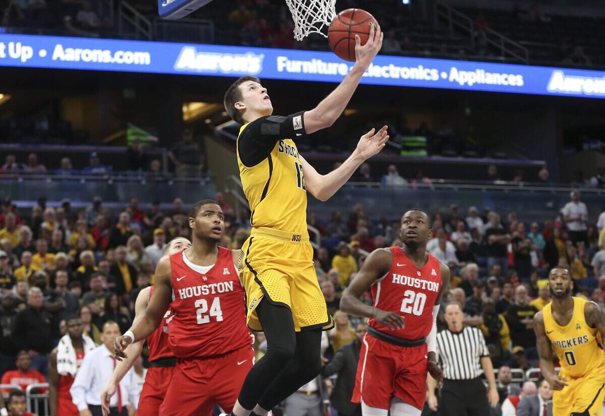 Wichita State guard Austin Reaves took a shot against Houston during the first half of an AAC Tournament semifinal game March 10 in Orlando, Fla. Reaves recently announced he had decided to transfer from Wichita State.