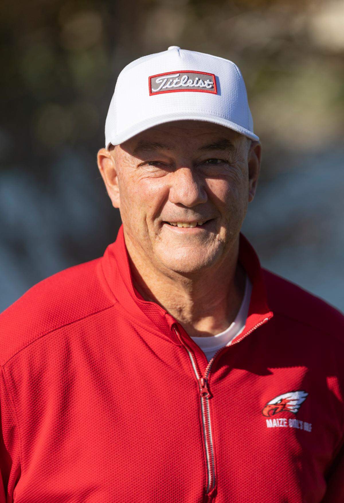 Maize coach Ben Harlow was the Coach of the Year on the All-Metro girls golf team.