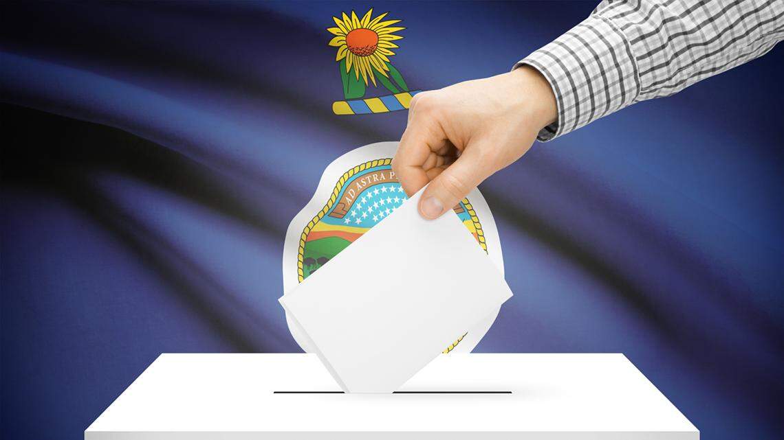 Voting concept - Ballot box with Kansas flag on background election vote state
